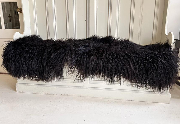 natural black shaggy sheepskin rug