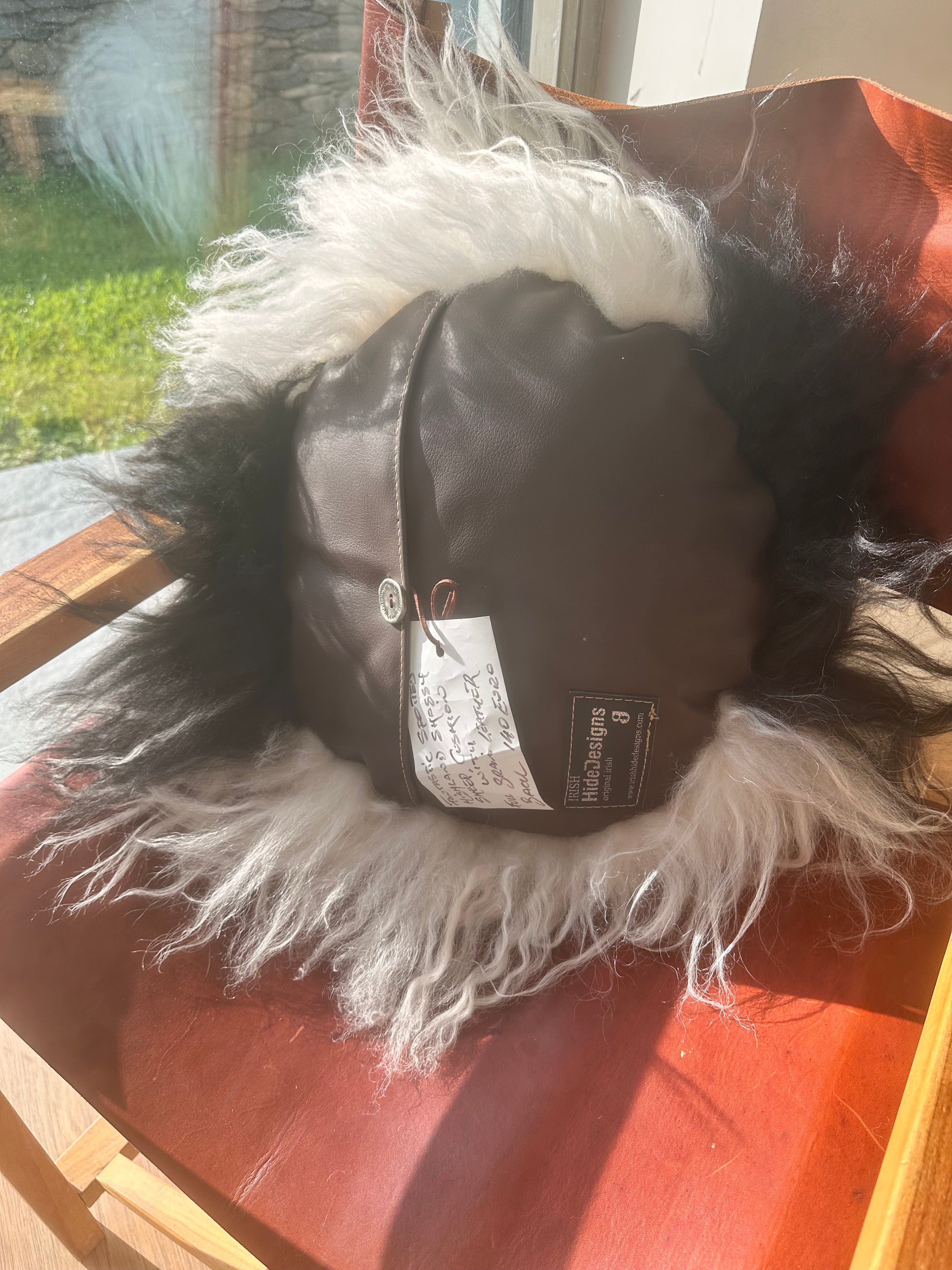 Unique natural black /white shaggy sheepskin cushion