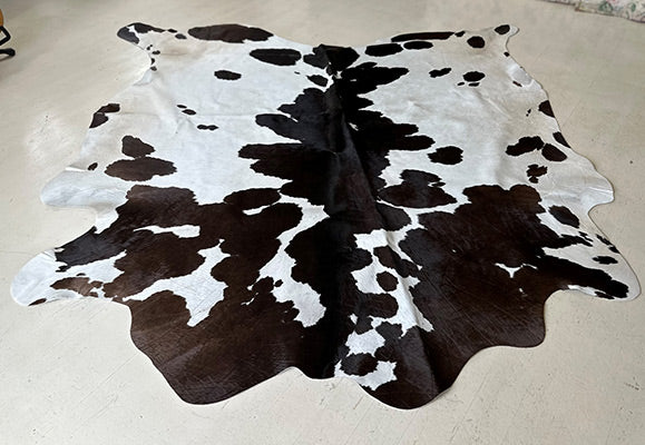 black and white cowhide rug