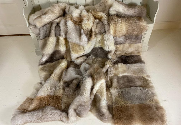 chequered beige lambskin throw