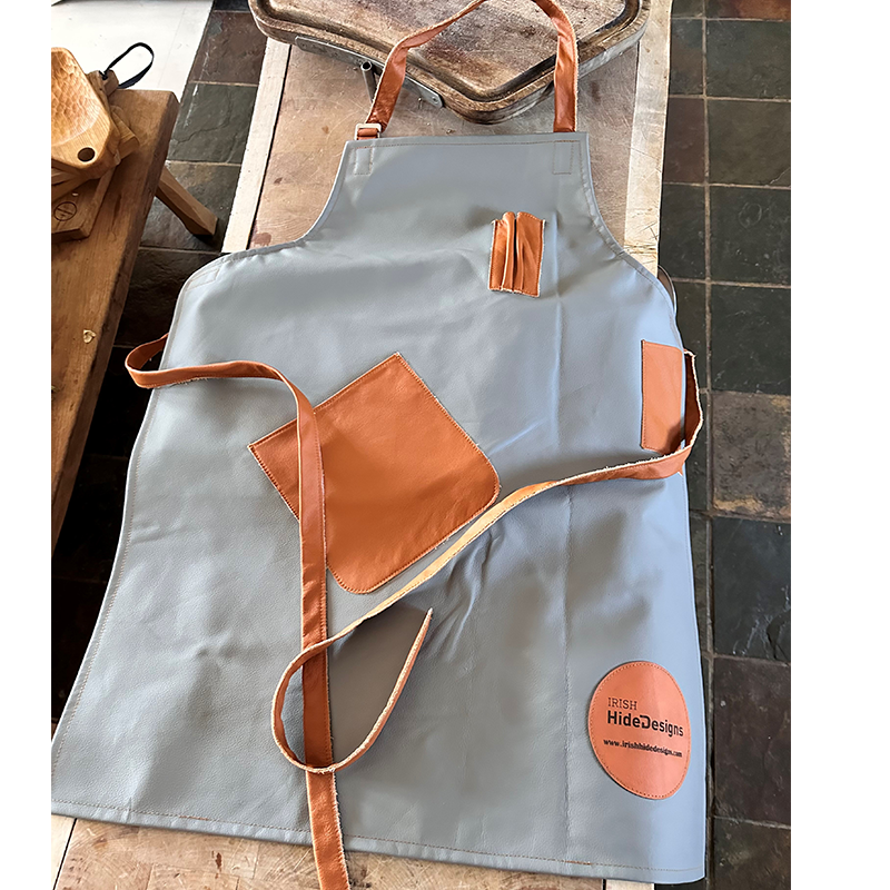 grey and tan leather apron