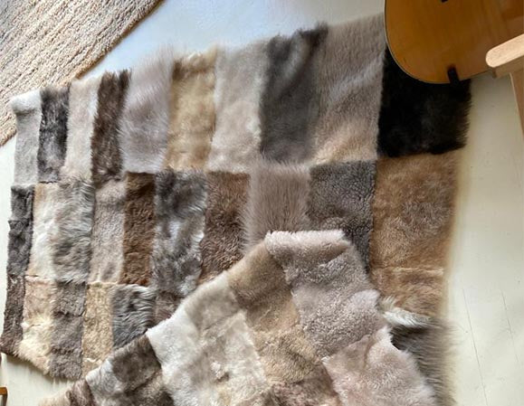 chequered lambskin throw