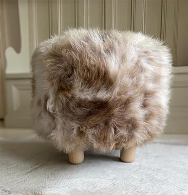 footstool made from sheepskin