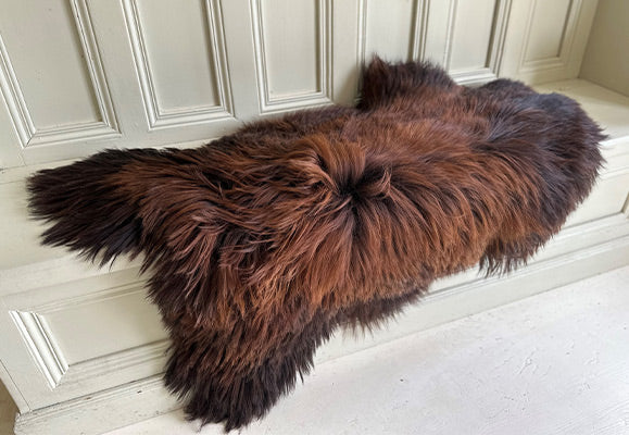 shaggy brown sheepskin rug