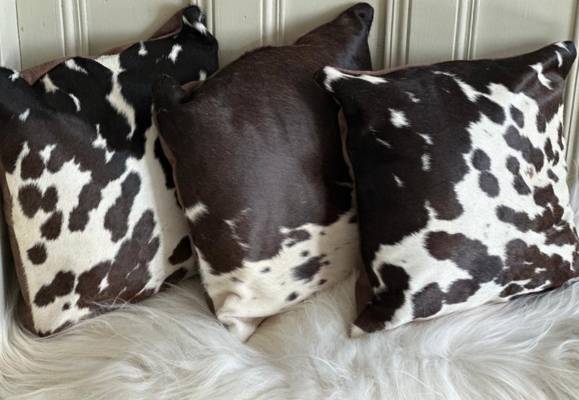 black and white cowhide cushions