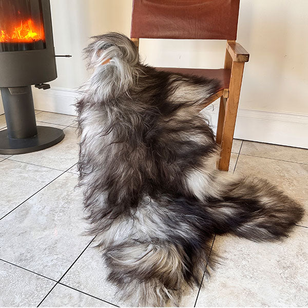 black and grey sheepskin rug