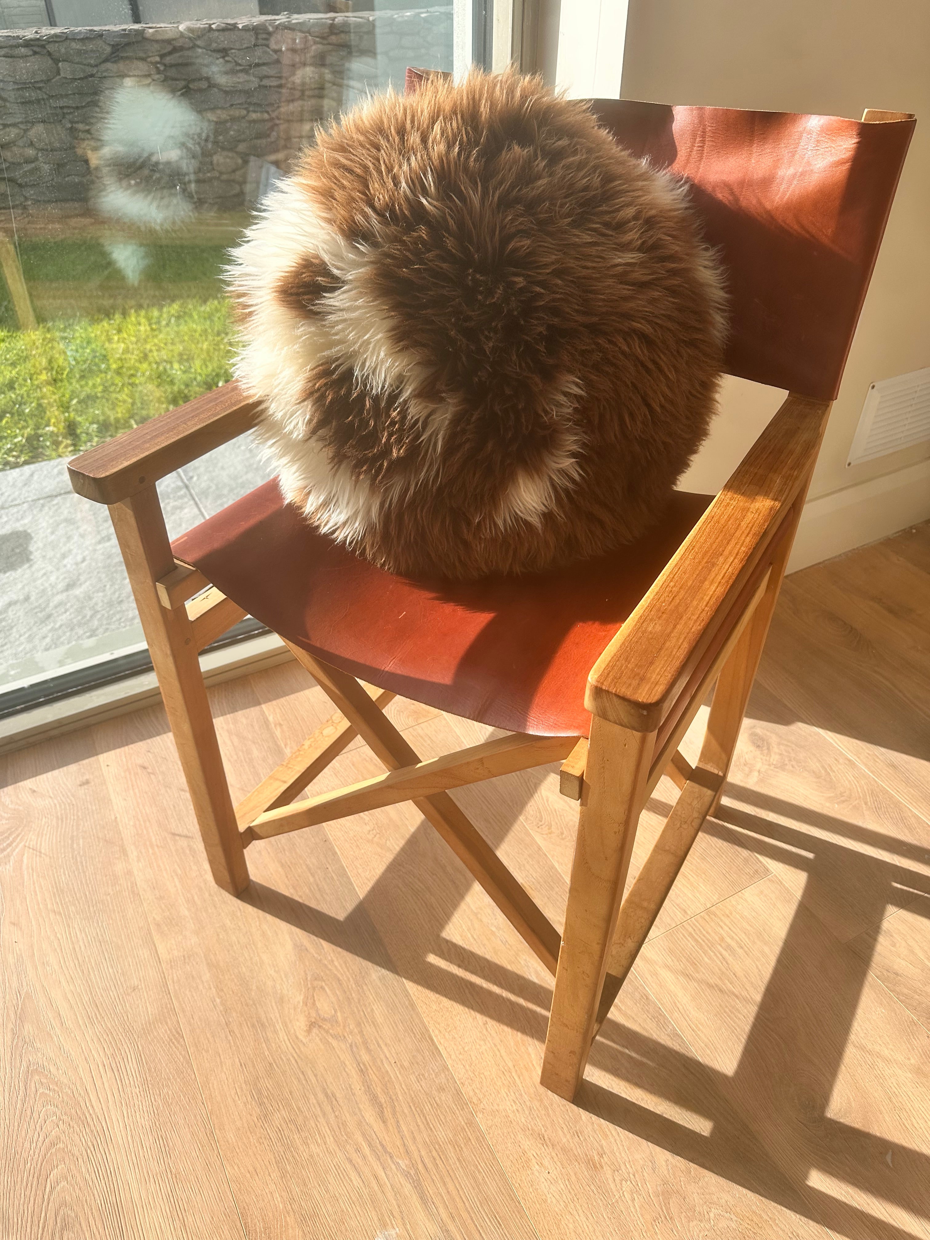 Round spotted sheepskin cushion