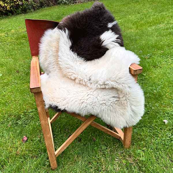 cream and brown sheepskin rug