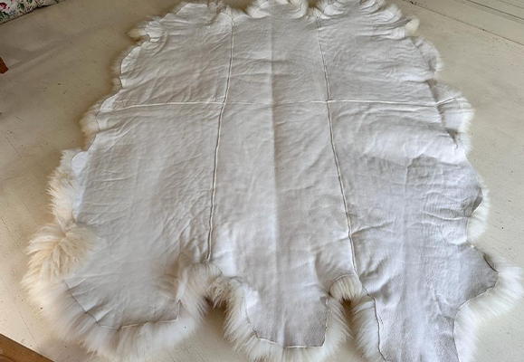rear of extra large white sheepskin rug