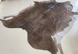 light brown cowhide rug
