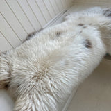 large natural white sheepskin rug