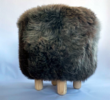 brown sheepskin footstool