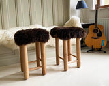 stool made from oak and sheepskin