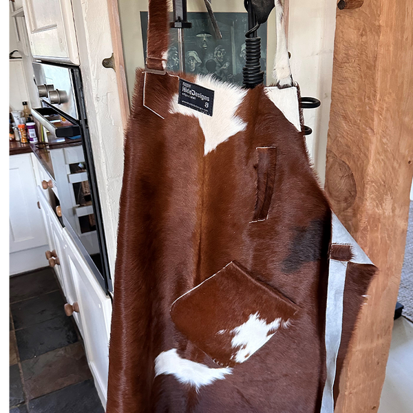red and white calf skin apron
