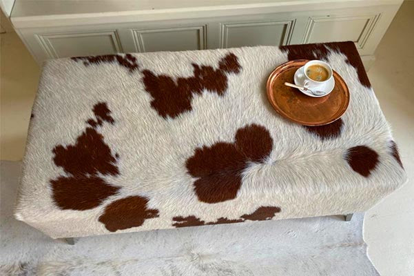 cowhide ottoman unique