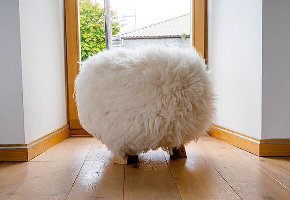 white sheepskin stool