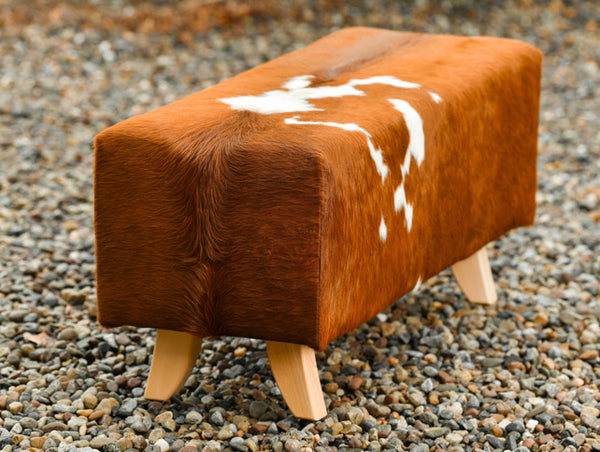cowhide ottoman red and white