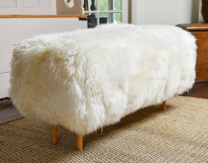 large white sheepskin ottoman