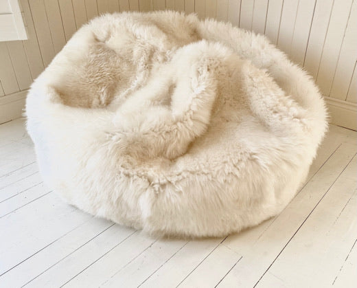 large white sheepskin beanbag