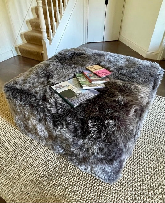 large grey sheepskin ottoman