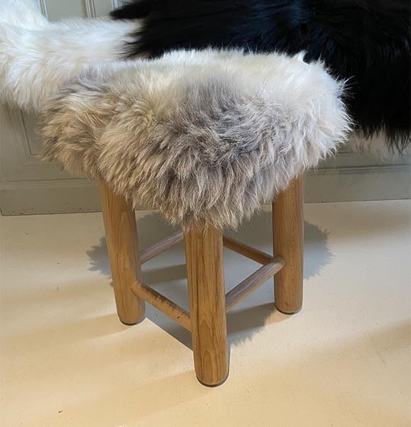 grey sheepskin stool