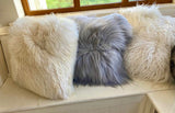 grey and white sheepskin cushions