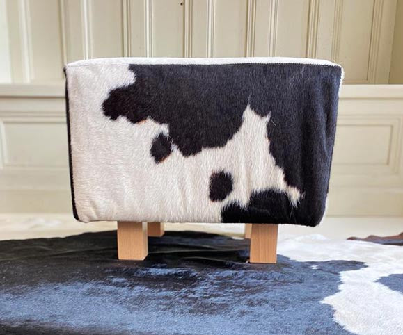 black and white cowhide stool