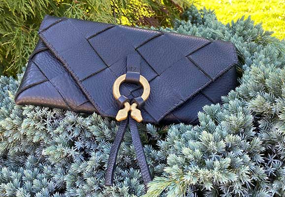 large leather clutch bag in black