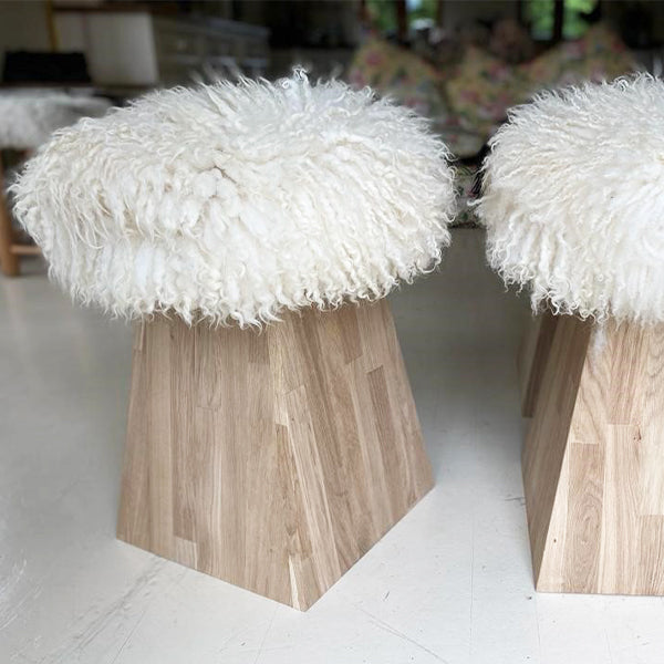 white mushroom sheepskin stool