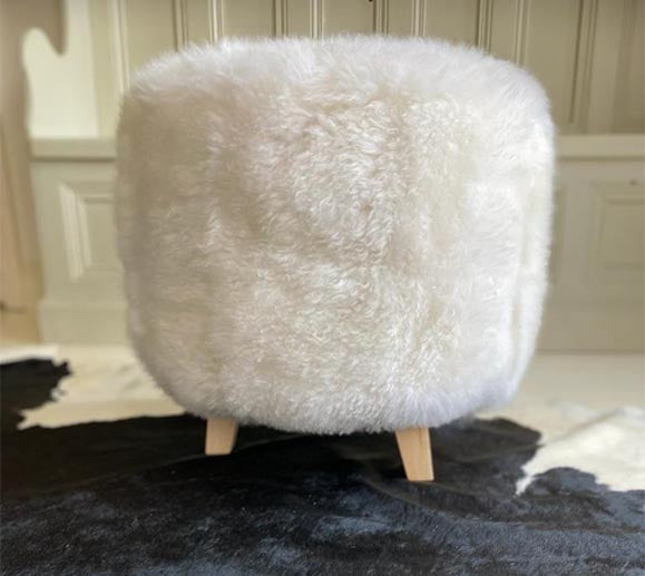 white sheepskin footstool