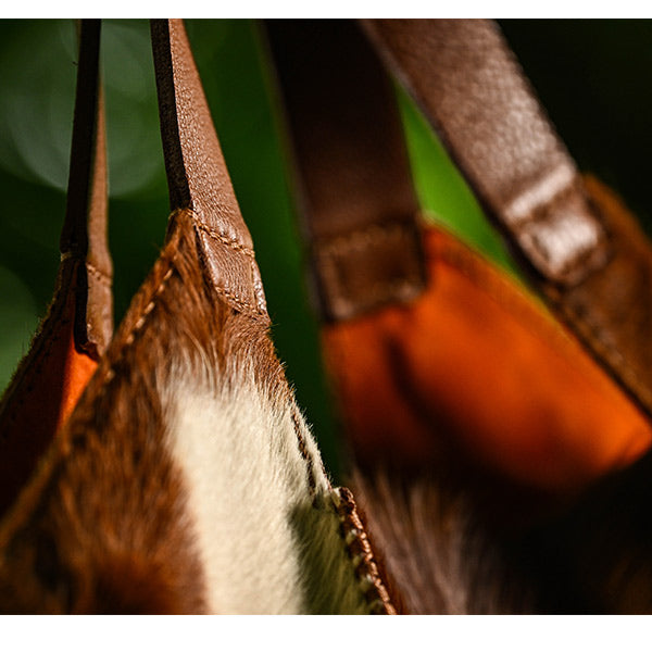 red and white cowhide handmade bag detail