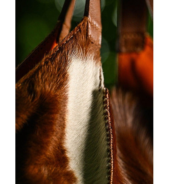 red and white cowhide handmade bag stitching